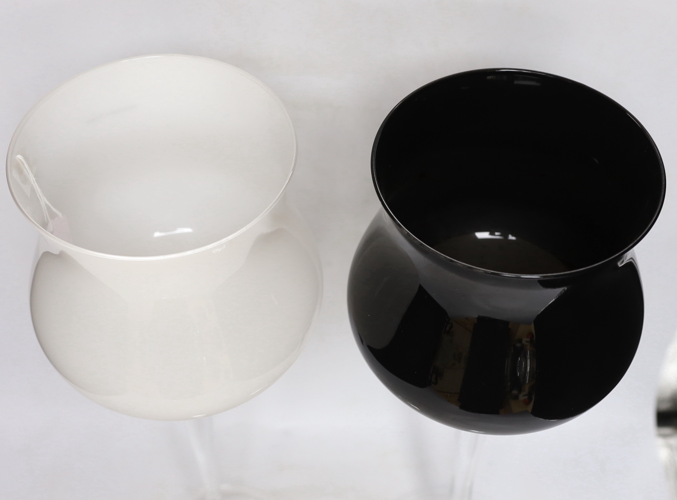 A pair of Polish black and white tall stemmed large bowled glasses, 50cm high